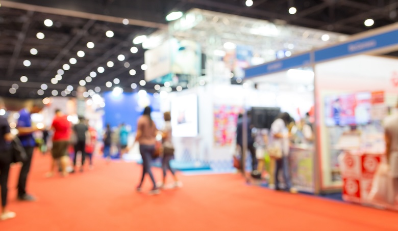 A blurry photo of an exhibition floor.